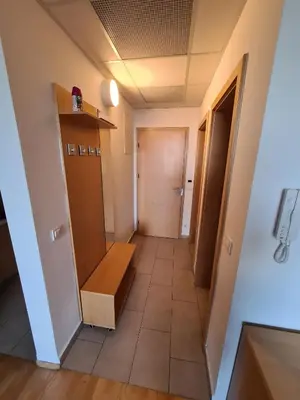 a corridor of a room with a closet and a door at Villa Mari - apartma št. 6 in Maribor