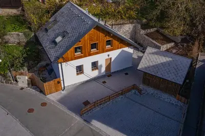 an overhead view of a house with a swimming pool at Bled House Of Green in Bled