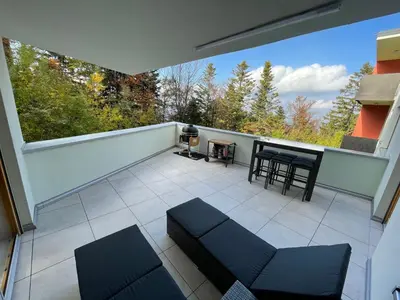 a view of a balcony with a table and chairs at Luxury 3-room large Apartment Maribor Pohorje in Pohorje