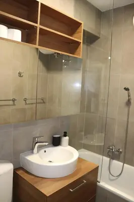 a bathroom with a sink and a shower at Studio apartma Terme Ptuj in Ptuj