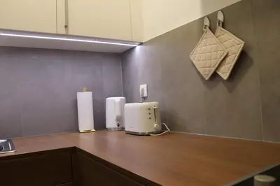 a kitchen with a counter top with aounter at Studio apartma Terme Ptuj in Ptuj