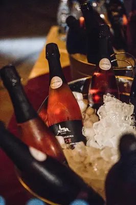 a group of bottles of champagne on a table at Vina Kobal, Kobal Family Estate in Štanjel