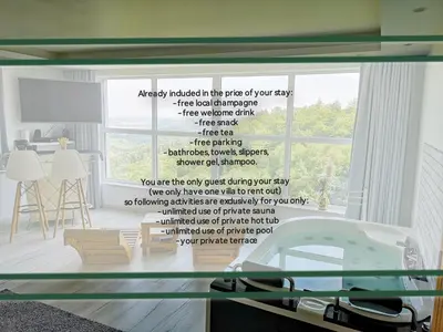 a wall sticker of a bath tub in a room at Private wellness with panoramic view, sauna & jacuzzi in Maribor