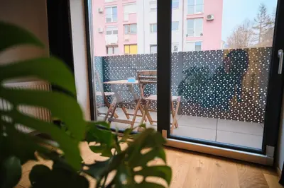 a view of a patio from a window with a table at Vacation Station Kamnik in Kamnik