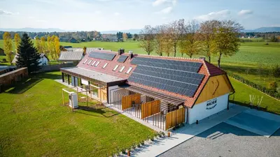 an overhead view of a house with solar panels on it at Resort Village Majer - Apartments, Glamping - Slovenia in Gradac