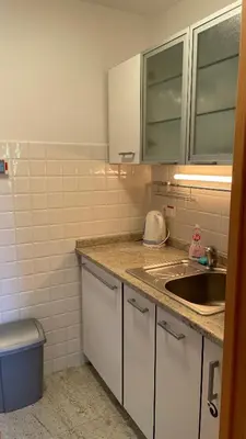 a kitchen with a sink and a counter top at Apartment Katrca Kranjska Gora in Kranjska Gora