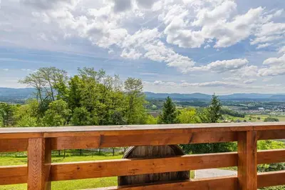a view from the deck of a house with a wooden fence at Holiday home in Novo Mesto - Dolenjska Bela krajina Unter- Weißkrain 35158 in Novo Mesto
