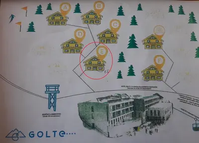 a diagram of a building with houses and trees at Golte Apartment Tibona in Mozirje