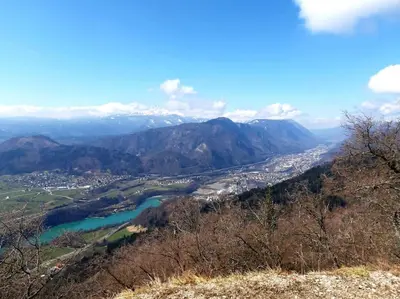 a view of a city and a river from a mountain at Apartma Juli in Žirovnica