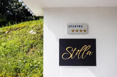 a sign on the side of a building at Luxury Apartment Stilla in Bled