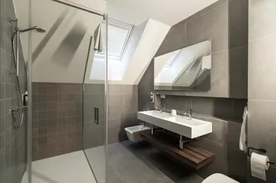 a bathroom with a sink and a shower at Luxury Apartment Stilla in Bled