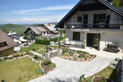 an aerial view of a house with a garden at apartmaji LEJARDIN in Škofljica