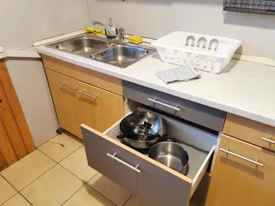 a kitchen with a sink and a dishwasher at Apartment for four with free parking in Ljubljana