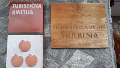 two signs on a wall with hearts on it at Houses and Apt in Smarjeske Toplice Kranjska Krain 26042 in Smarjeske Toplice