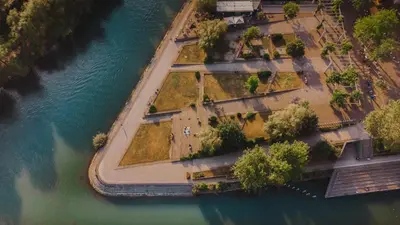 an aerial view of a sidewalk next to the water at That Cat Flat - free parking, near city center, cats! in Ljubljana