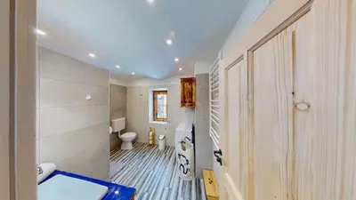 a bathroom with a sink and a toilet in it at hiša Margit, Rateče 150 in Rateče