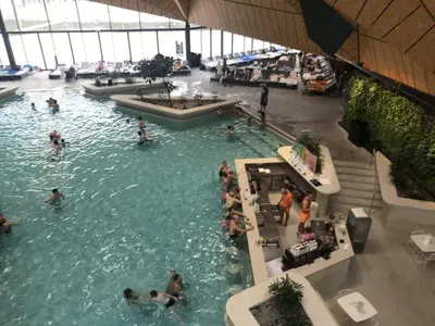 a group of people in a swimming pool at E79 AQUALUNA KAMP NATURA PODČETRTEK card not included in Podčetrtek