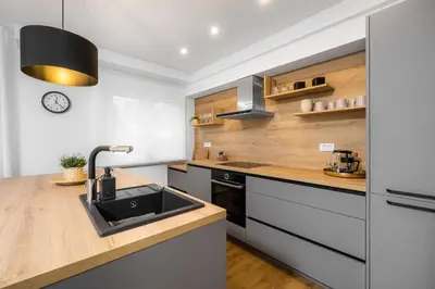 a kitchen with a sink and a counter at Apartmaji Spalina, Ivančna Gorica in Veliko Črnelo