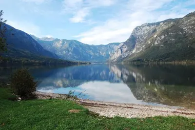 a view of a lake in the middle of a mountain at Dandelion House in Podjelje