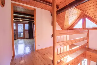 a view of a room with a wooden ceiling at River Valley View House in Bohinjska Bistrica