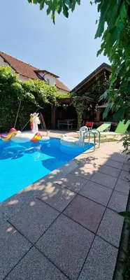 a swimming pool with a pool antidepressivist at APARTMAN MURKO S-1 in Brest