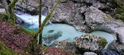 a small pool of water in the middle of a river at Apartma Humar in Kobarid