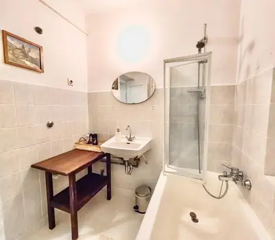 a bathroom with a sink and a shower and a tub at Alpine Home - Rooms in Kranjska Gora