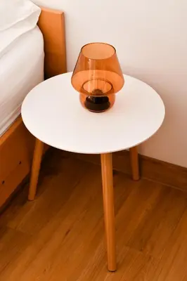 a white table with a glass on top of it at Miadora apartments - Apartma Idina in Moravske Toplice