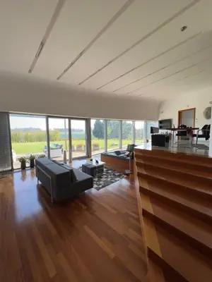 a living room with a couch and a table at Residence in Moravske Toplice
