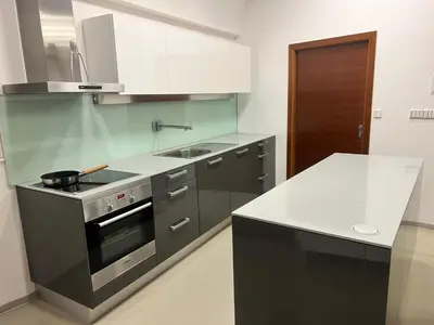 a kitchen with a stove and a sink at Residence in Moravske Toplice