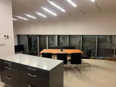 an office with a table and chairs in a room at Residence in Moravske Toplice