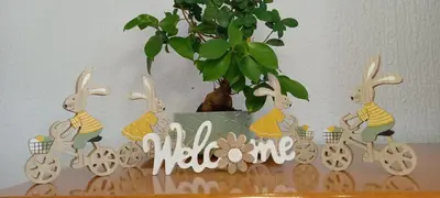 a group of bunnies riding a train with a plant at Apartment Ajdi in Ajdovščina