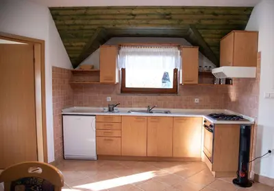 a kitchen with a sink and a stove at Holiday home in Metlika Kranjska Krain 26051 in Metlika