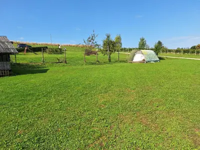 a field with a tent in the middle of a field at Camping Silva in Ljutomer