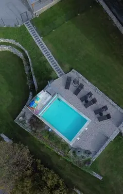 an overhead view of a swimming pool in a yard at Holiday House Sunset Spa in Šentjernej
