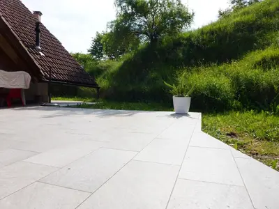 a patio with a plant in a pot on it at Apartment Jalps 3 in beautiful Bohinjska Bistrica in Bohinj