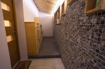 a hallway of a room with a brick wall at Holiday home in Sentvid pri Sticni - Zentralslowenien 43927 in Šentvid pri Stični