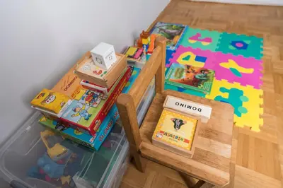 a wooden table with toys on top of it at DREAM & RELAX Apartment in Bohinj
