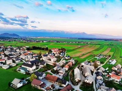 an aerial view of a village with houses at Apartment Mountain Sunrise in Škofja Loka