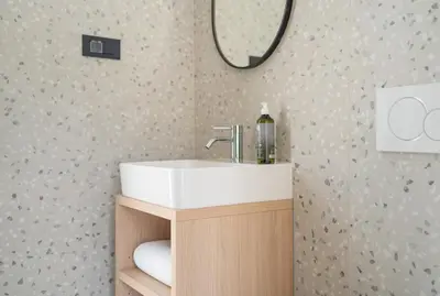 a bathroom with a sink and a mirror at Cabino - Fresh Air Resort in Bovec