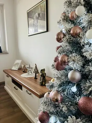 a christmas tree with ornaments on it at Apartment Country House Zaton in Tišina