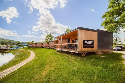 a shipping container house with a train on it at DELUXE Lake View Mobile Homes with Thermal Riviera Tickets in Čatež ob Savi