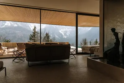 a living room with a view of a mountain at Chalet Sofija in Gozd Martuljek
