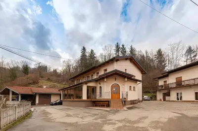 a large house with a driveway in front of it at Farm Stay Ivankotovi in Prem