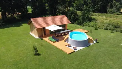 an overhead view of a gazebo with a swimming pool at Glamping na podeželju in Lutverci