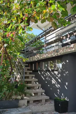 a set of stairs leading up to a building at Apartment Kamnik-apartment with a large terrace in Kamnik