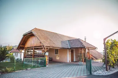 a house with a fence in front of it at Holiday home in Mirna Kranjska Krain 36158 in Mirna
