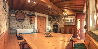 a dining room with a wooden table in a room at Holiday home in Mirna Kranjska Krain 36158 in Mirna
