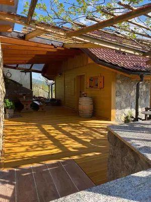 an outdoor patio with a wooden pergola at Holiday home in Drganja sela Kranjska Krain 42002 in Drganja Sela