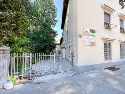 an entrance to a building with a fence at Classy & Cozy apartment in Ljubljana